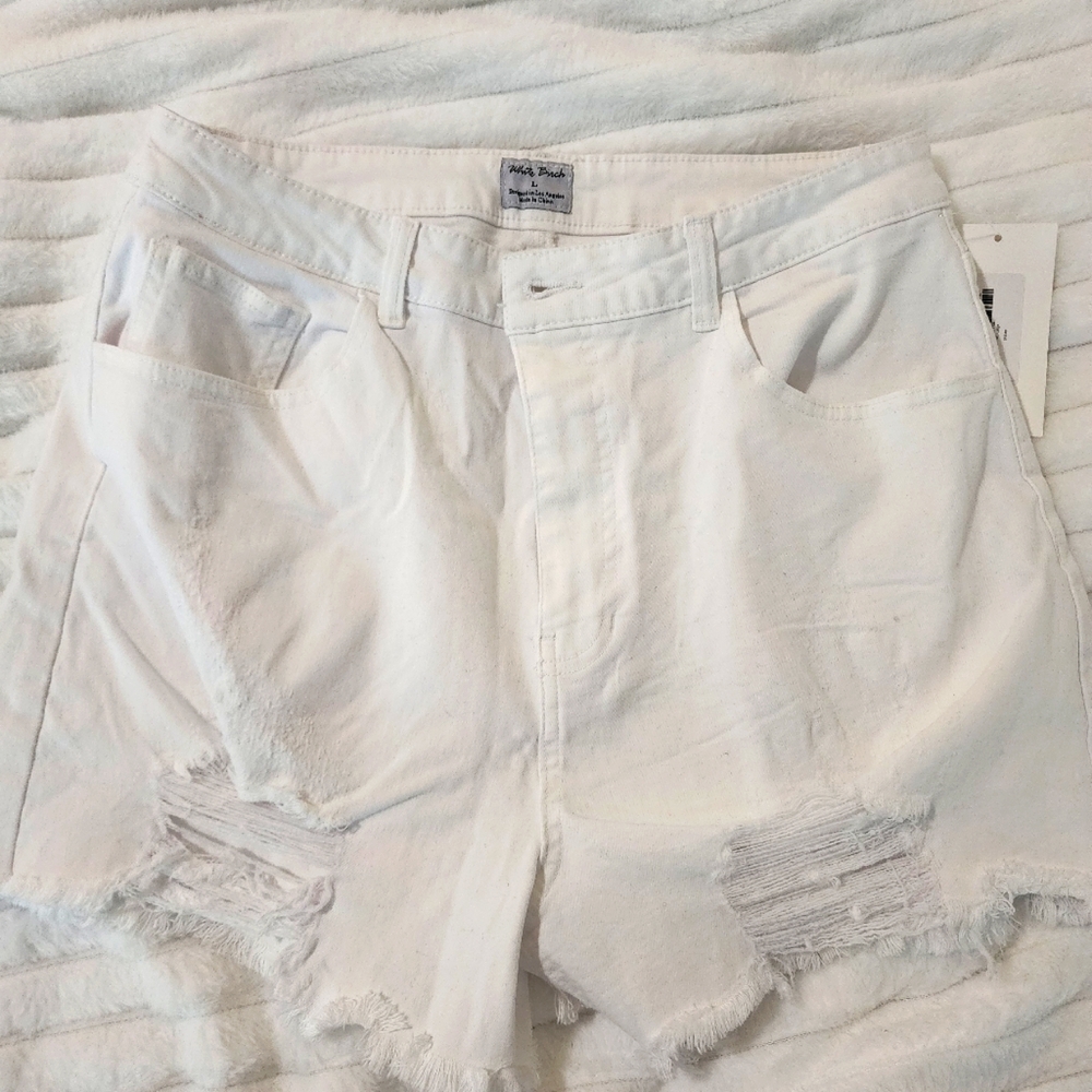 White Mid Rise Distressed Shorts